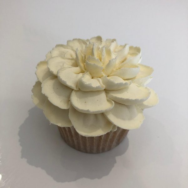 how to make a buttercream frosting flower, how to pipe buttercream flowers, how to pipe buttercream frosting flowers,